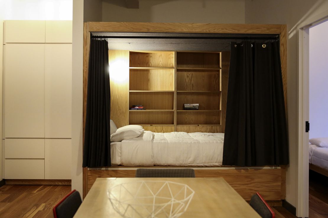 An alcove bed is seen off the dining room in an occupied unit at the WeLive building in New York, U.S., on Tuesday, Oct. 31, 2017.